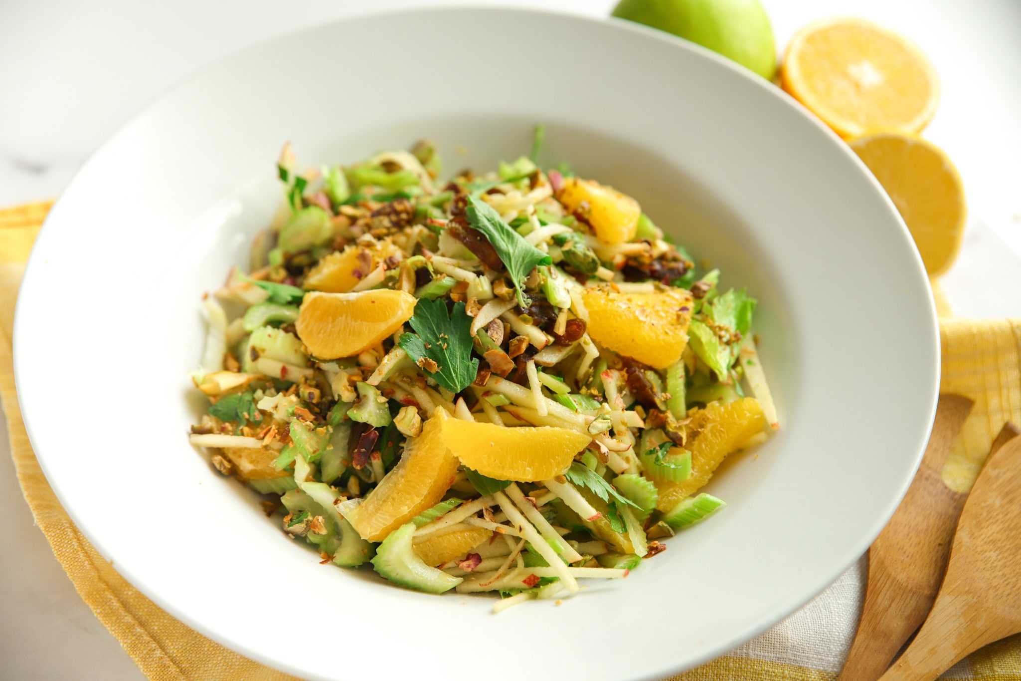  Orange, Celery, Apple, Date & Pistachio Salad in a bowl