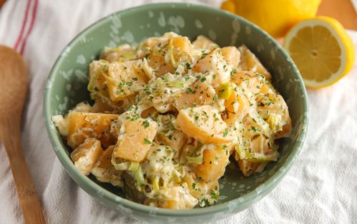 Creamy swede and leek salad served in a bowl, a lighter low-carb twist on classic potato salad using seasonal veg from Wonky Box.