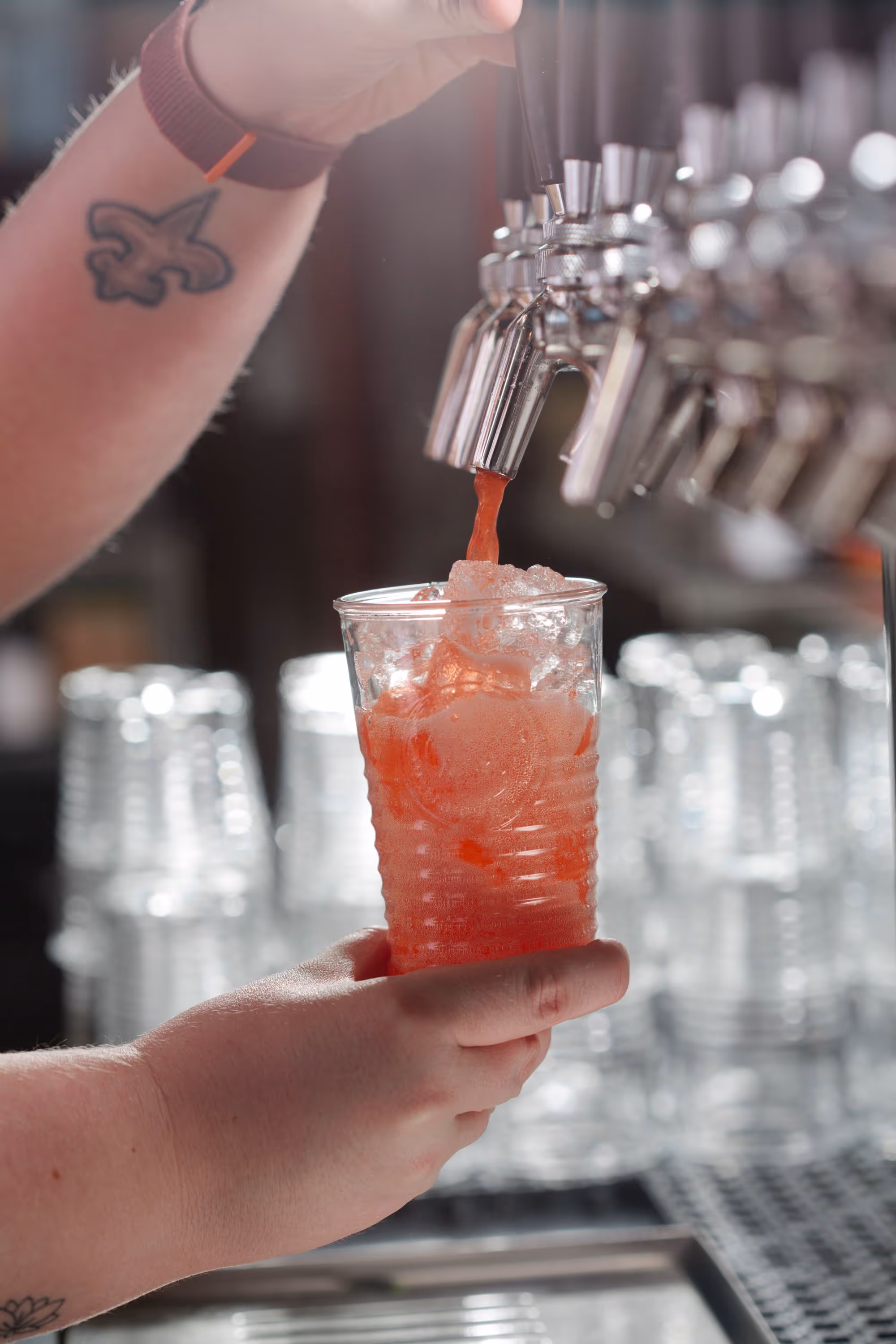 drink being poured from tap