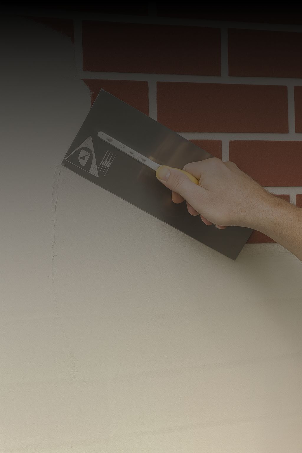 Render repair in Sydney – applying fresh render over brickwork to restore surface finish and durability