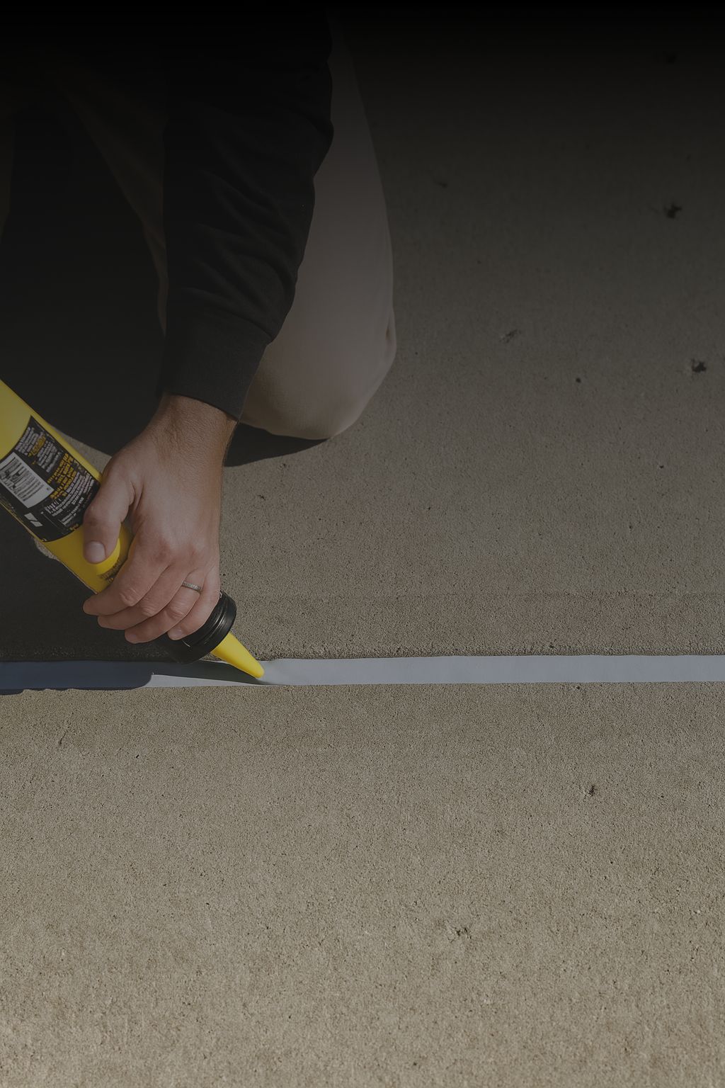 Defect repair in Sydney – sealing building joints with caulking to prevent water ingress and further damage.