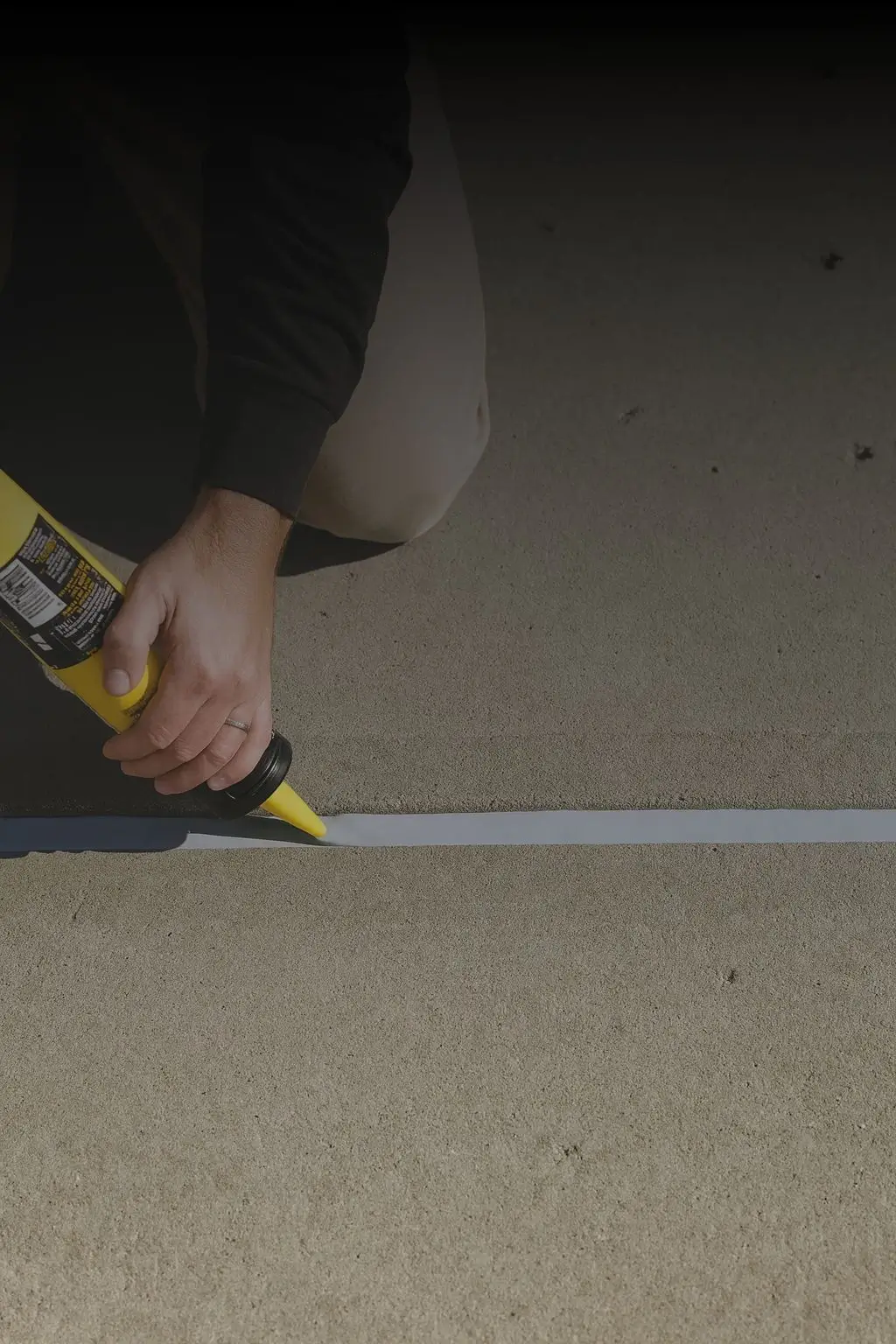 Defect repair in Sydney – sealing building joints with caulking to prevent water ingress and further damage.