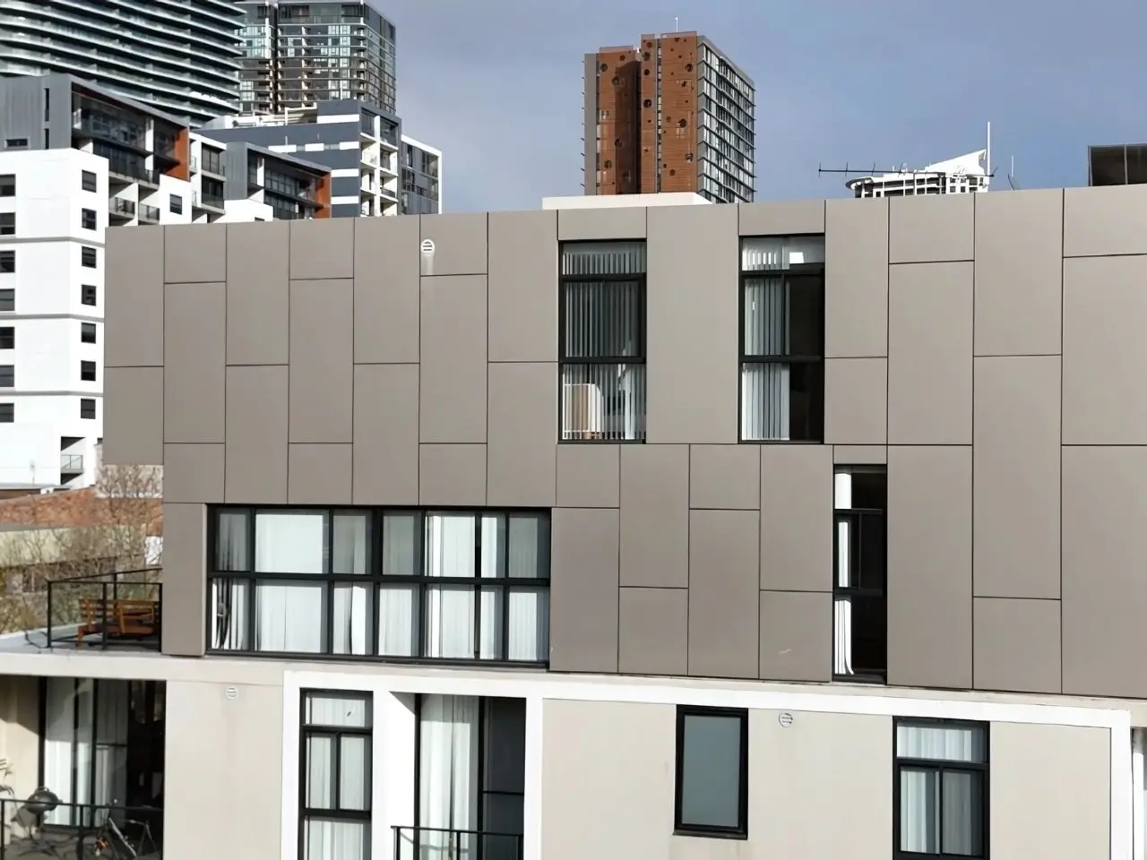 ACP cladding replacement at Chandos St, St Leonards — new compliant cladding panels across the upper facade
