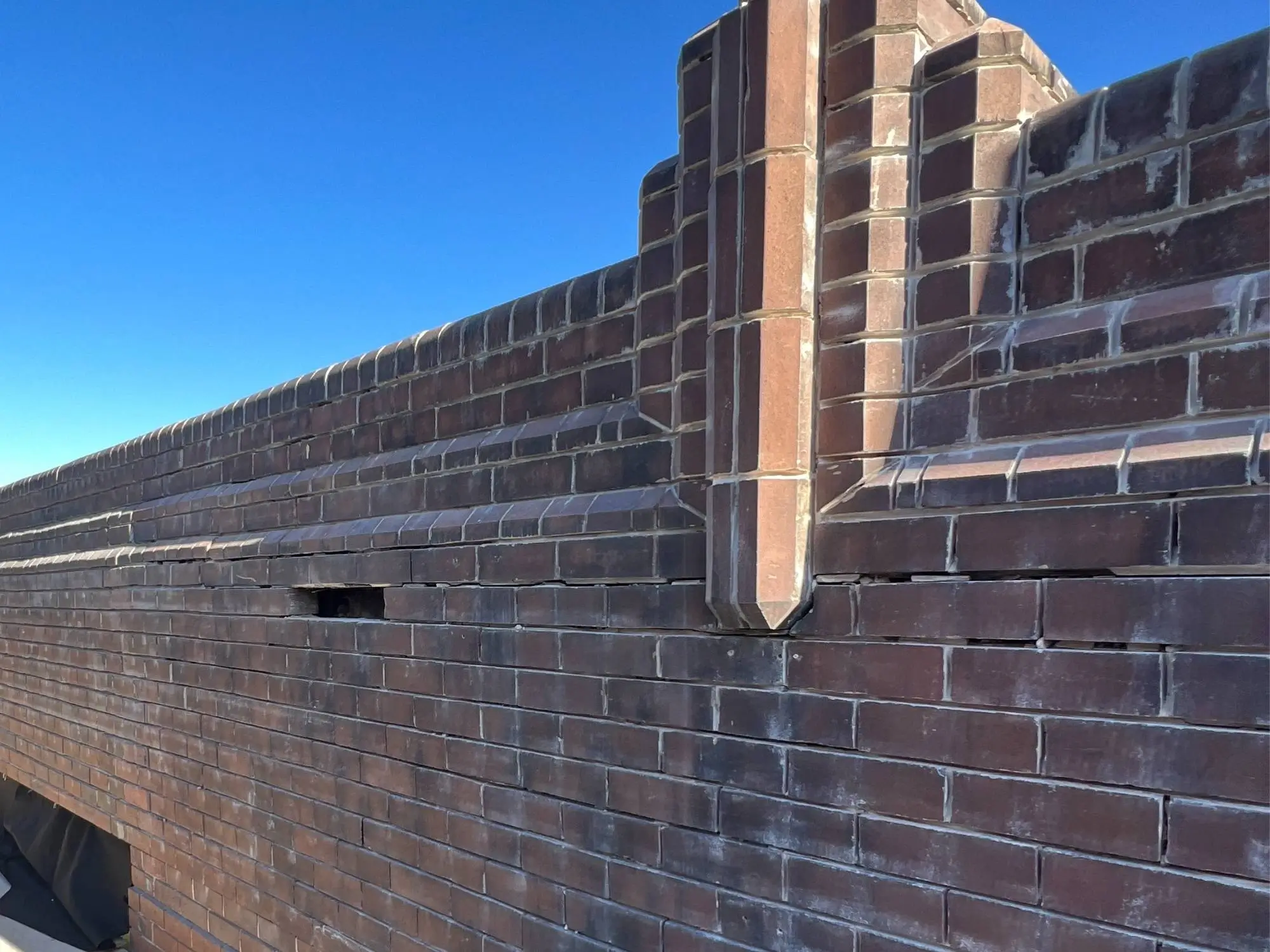 Brick restoration at Maddox St, Alexandria — crack repairs and repointing at the parapet pier