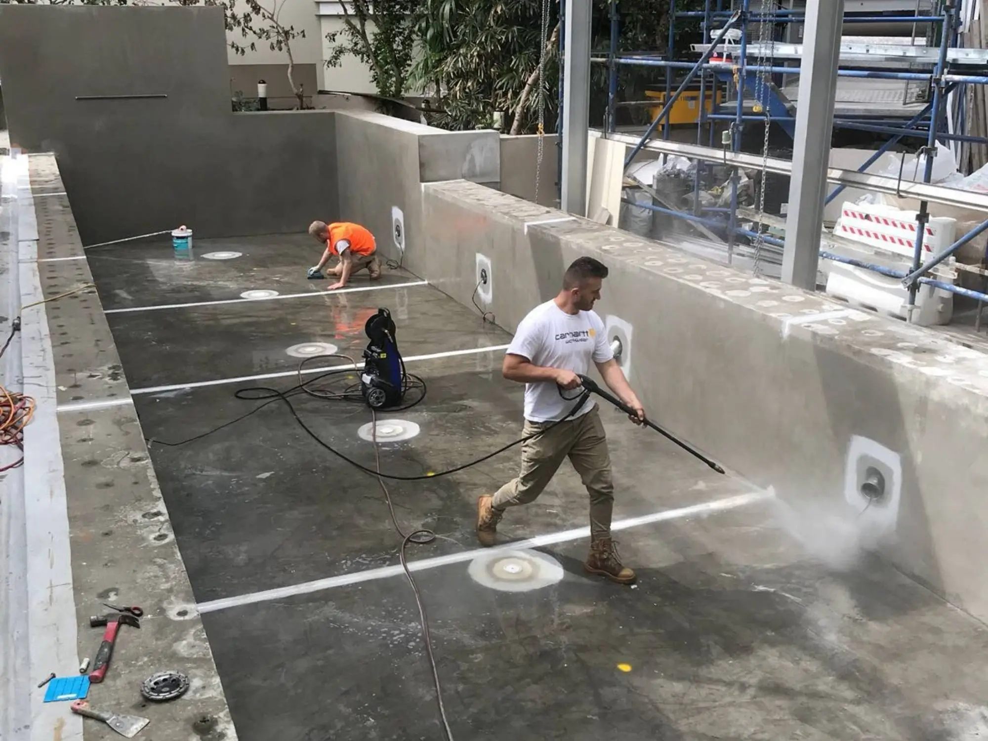 Pool remediation at Shelley St, Sydney CBD — pressure-cleaning and surface preparation of the pool shell