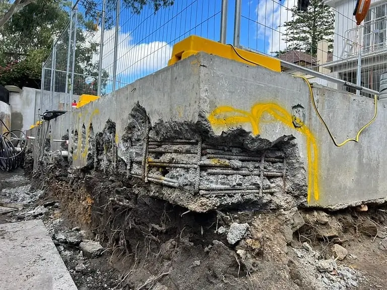 Concrete pool remediation at Coolong Rd, Vaucluse — excavated pool edge beam showing deteriorated concrete before repair