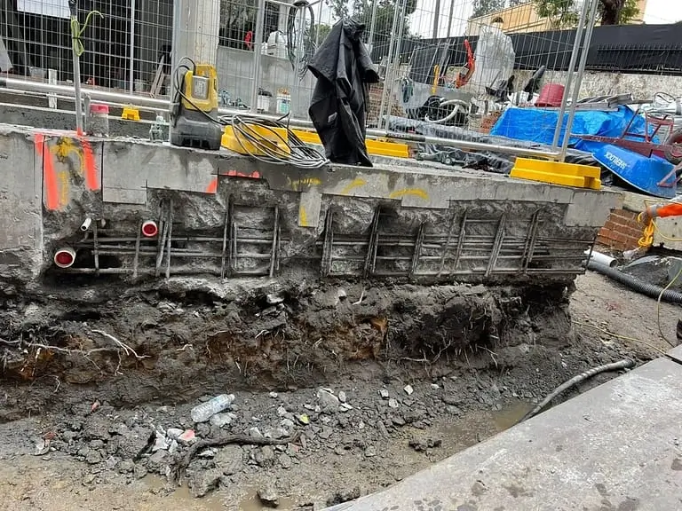 Pool edge beam repair at Coolong Rd, Vaucluse — new reinforcement and formwork fixed along the pool perimeter