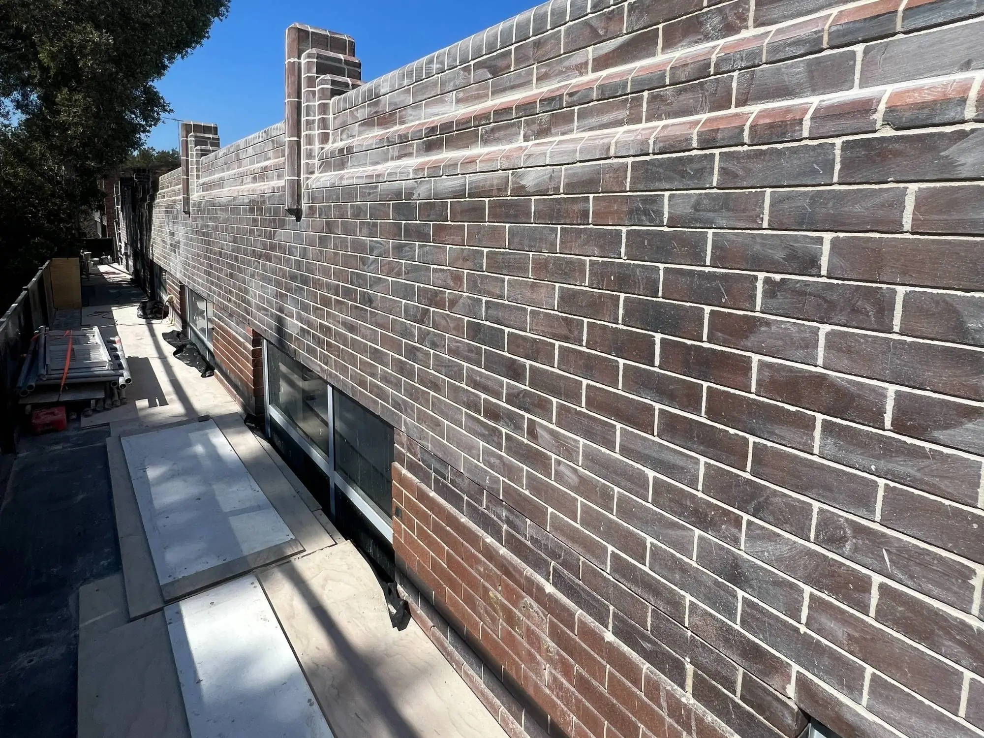 Heritage brick restoration at Maddox St, Alexandria — completed wall with restored bricks and new mortar joints