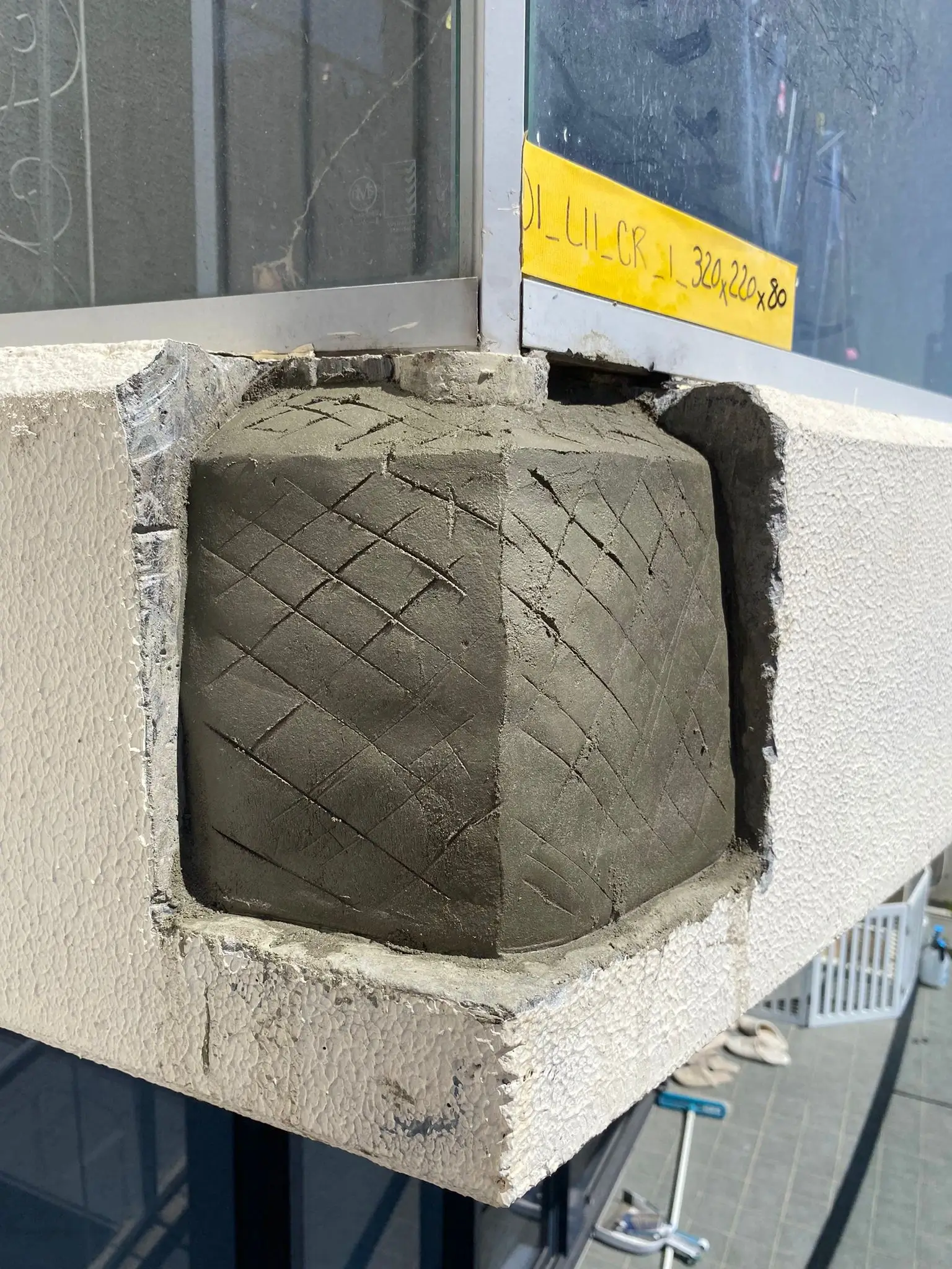 Concrete spalling repair at Sergeants Lane, St Leonards — repair mortar built up and scored over the treated reinforcement