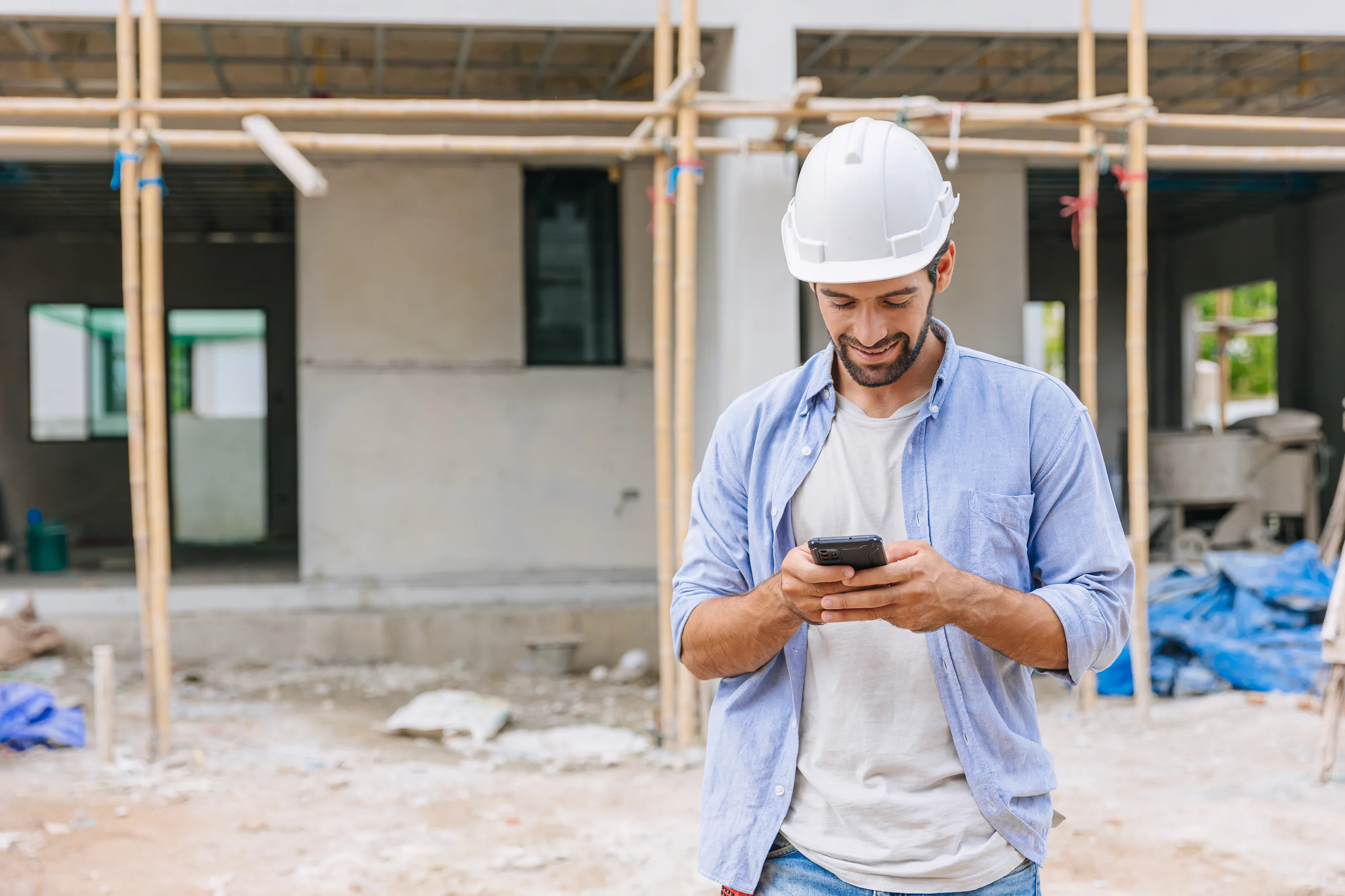 Business owner using a CRM on a phone