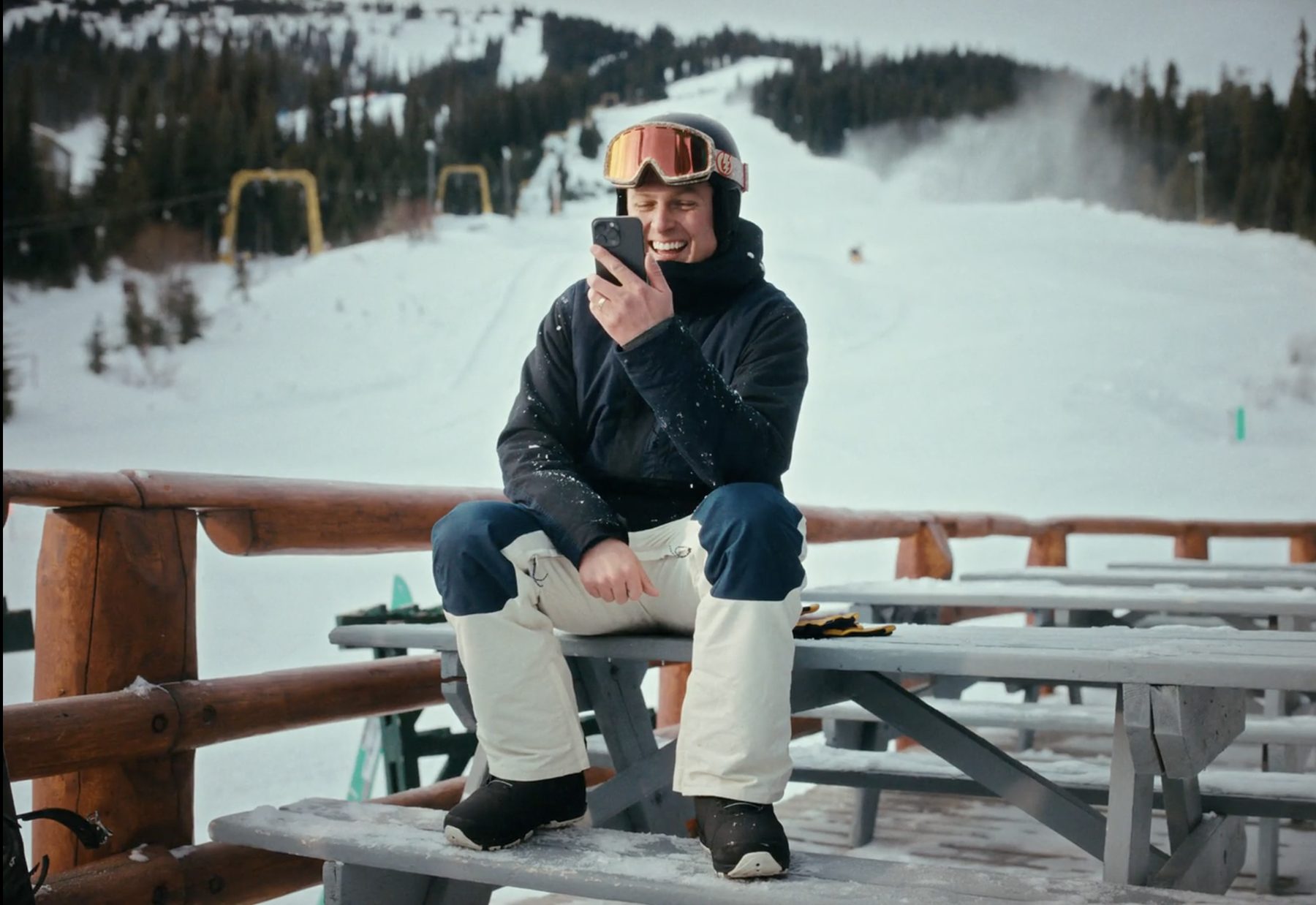 Frame from Get Away Mid-Day: the doctor on a call from the deck at Apex