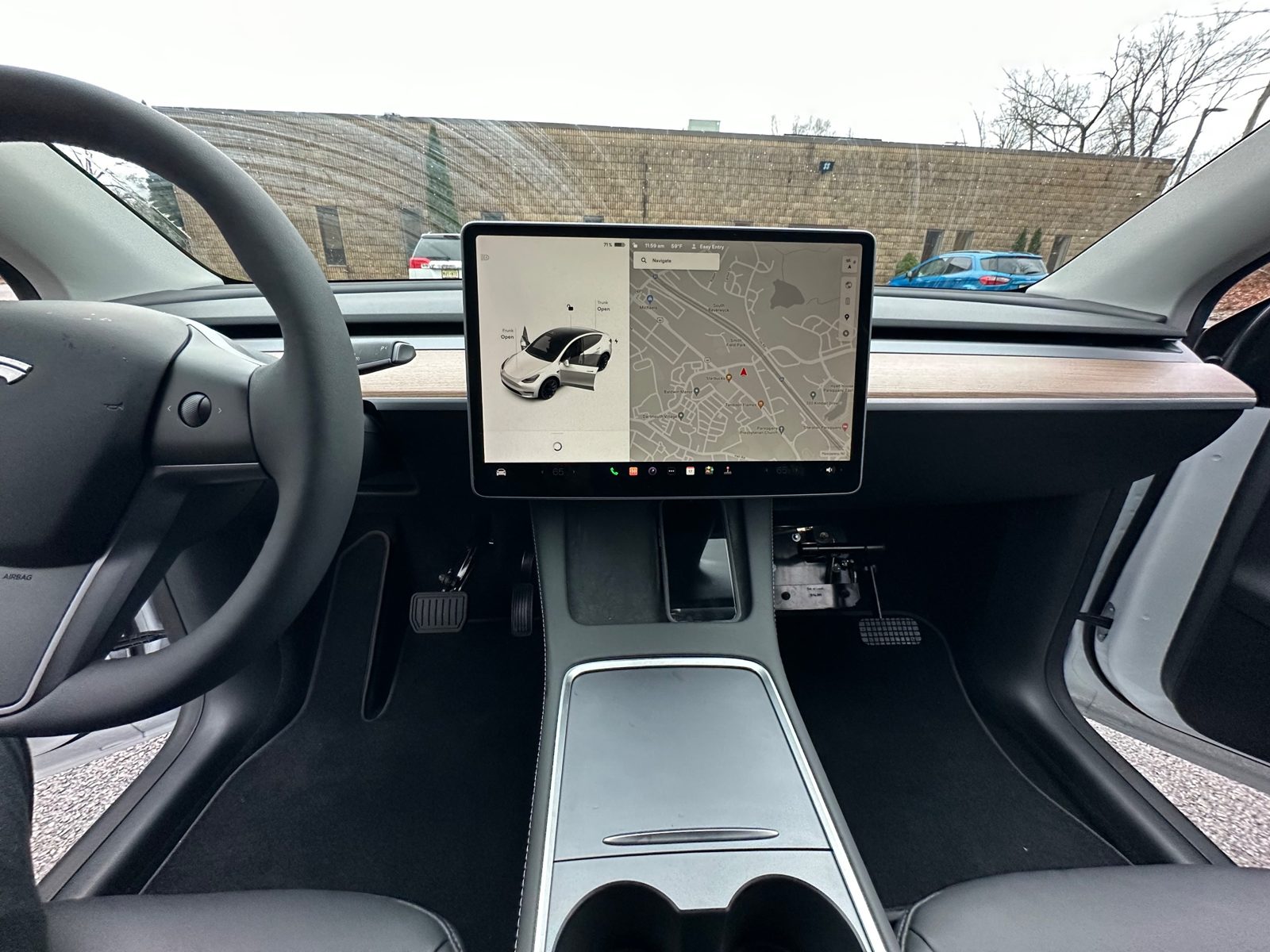 Tesla Model Y interior with Cable Brake on the passenger side