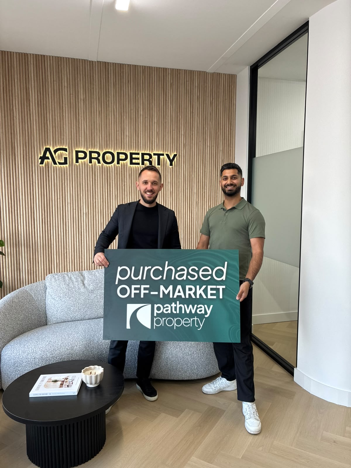 A Pathway Property client outside the home they purchased