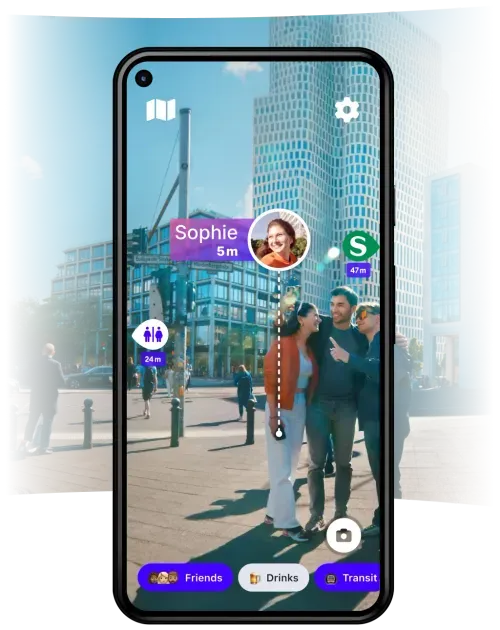Smartphone displaying an augmented reality app indicating the location of nearby friends and amenities in a city square with people in the background.