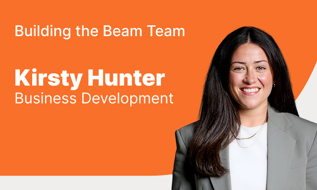 Building the Beam Team announcement featuring Kirsty Hunter, Business Development team member, smiling in a gray blazer against orange background.