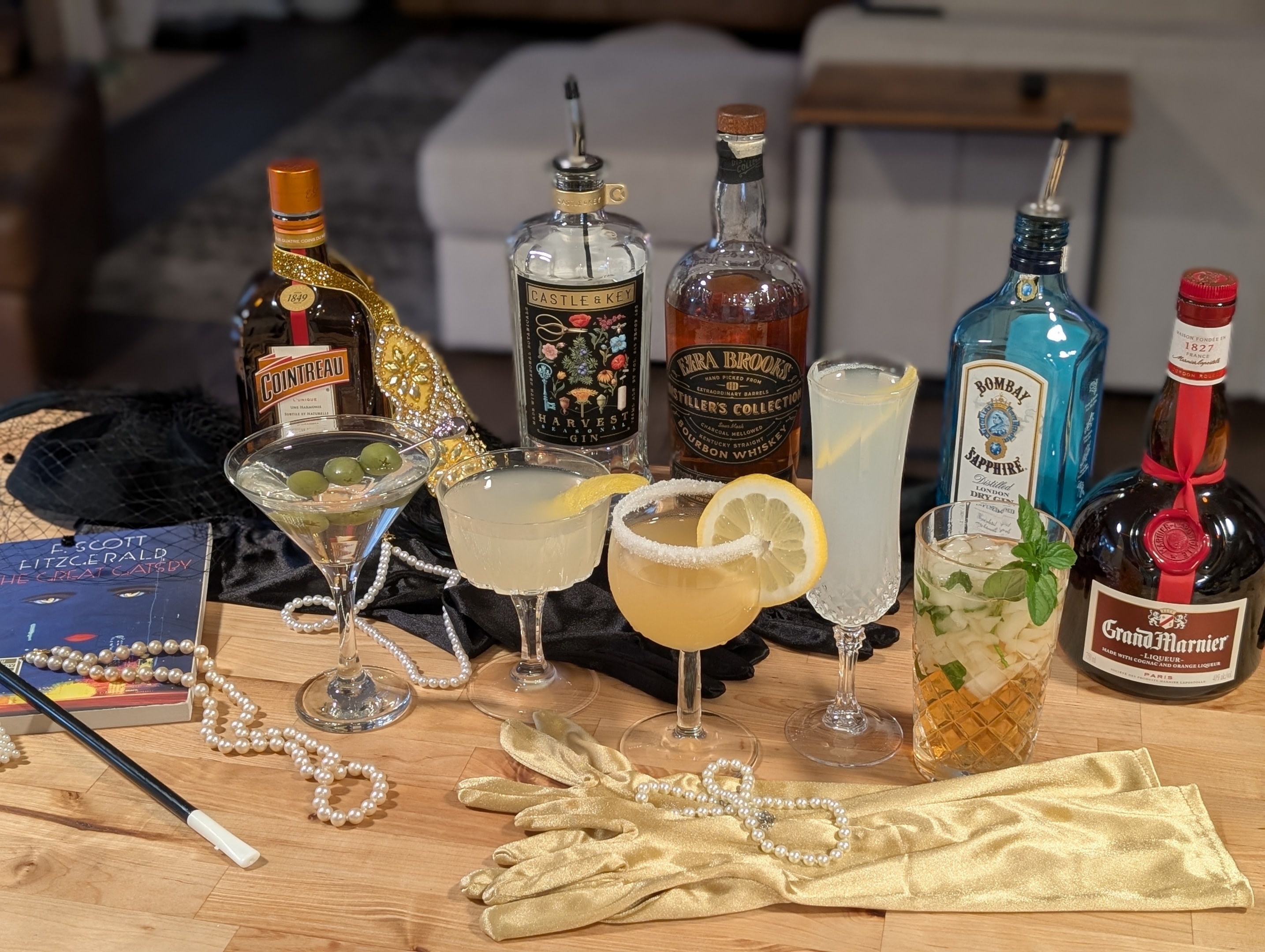 Classic cocktails with liquor bottles and 1920s props