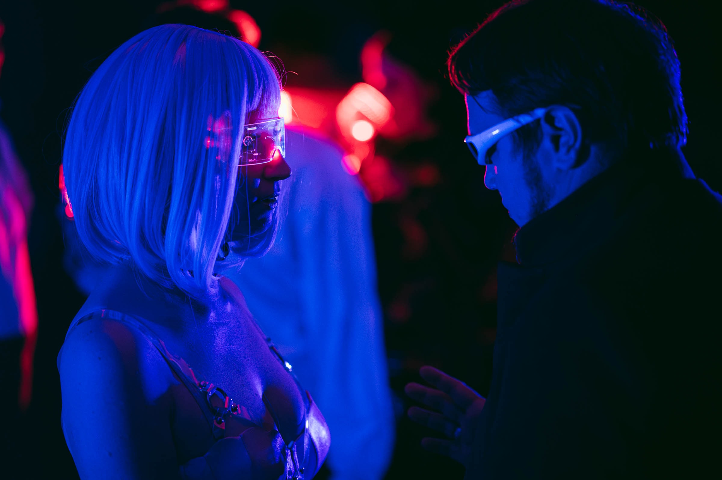 Guests at a cyberpunk murder mystery party