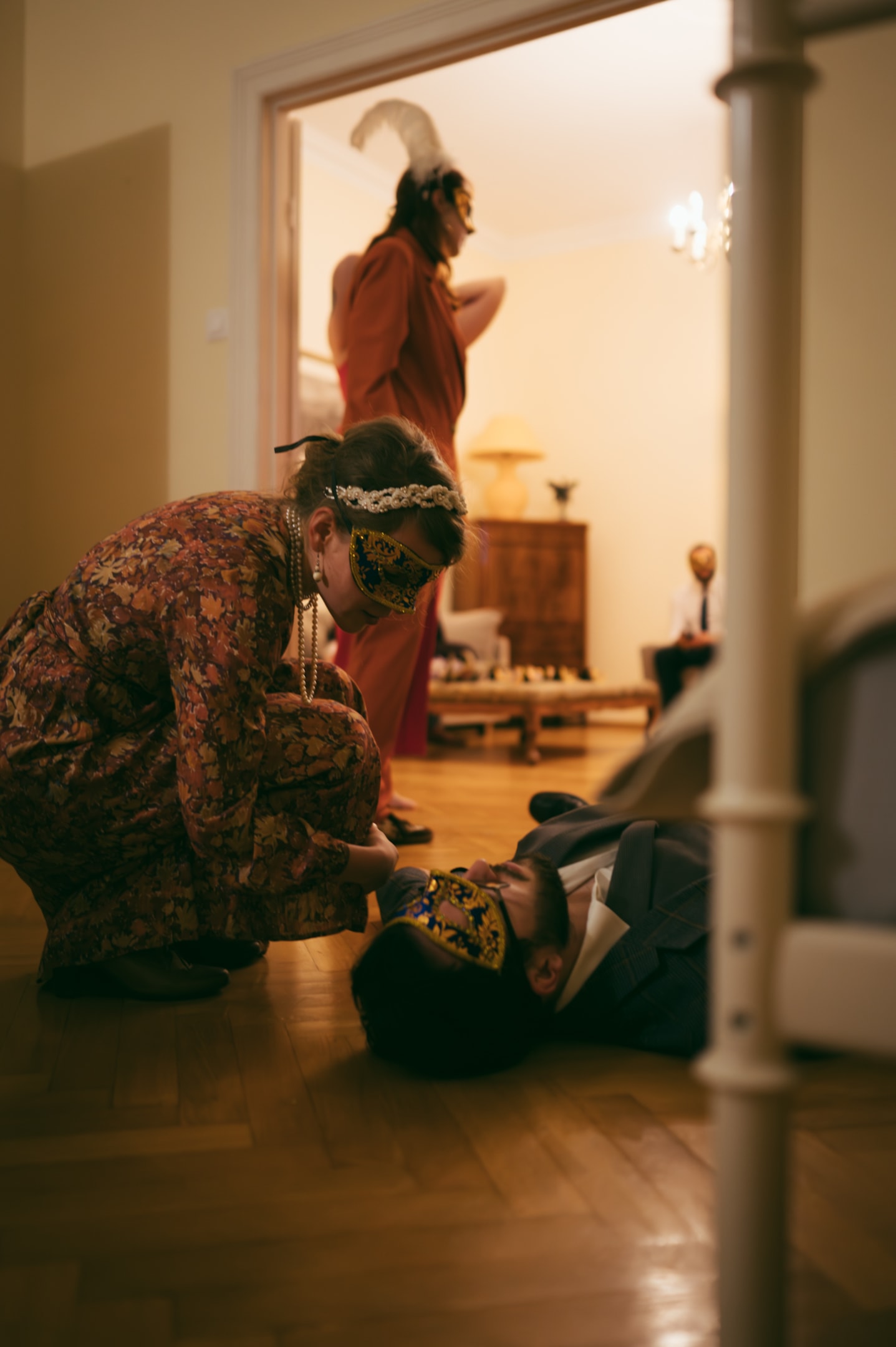 Guest role playing as a victim at a murder mystery party