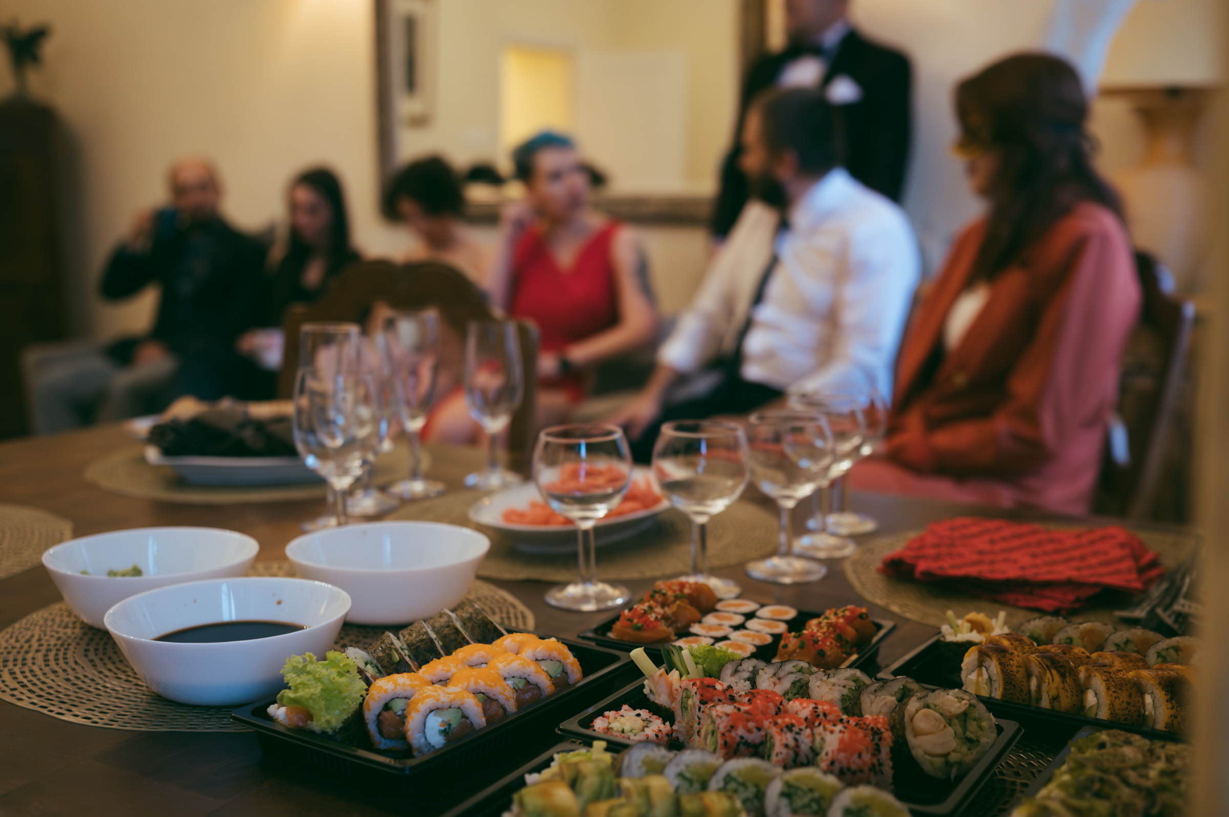 Murder mystery dinner party guests at the table