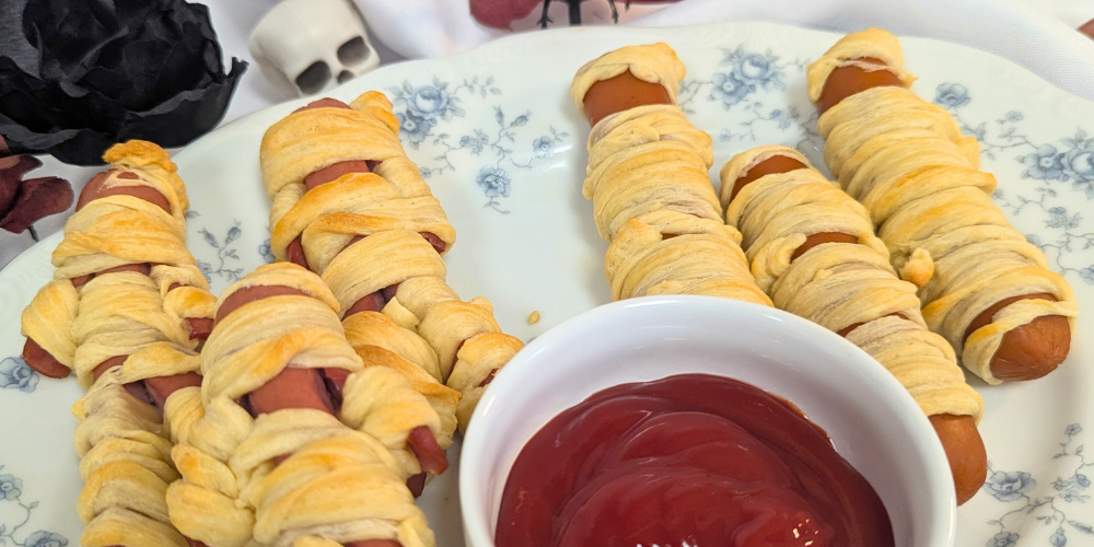 Mummy Hot Dogs with crescent dough for Halloween