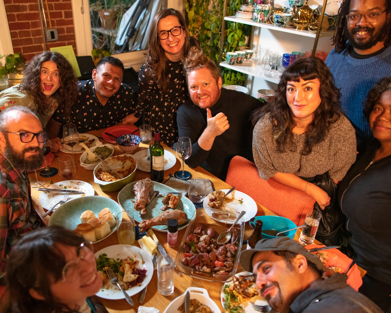 A group of friends enjoying a Friendsgiving meal