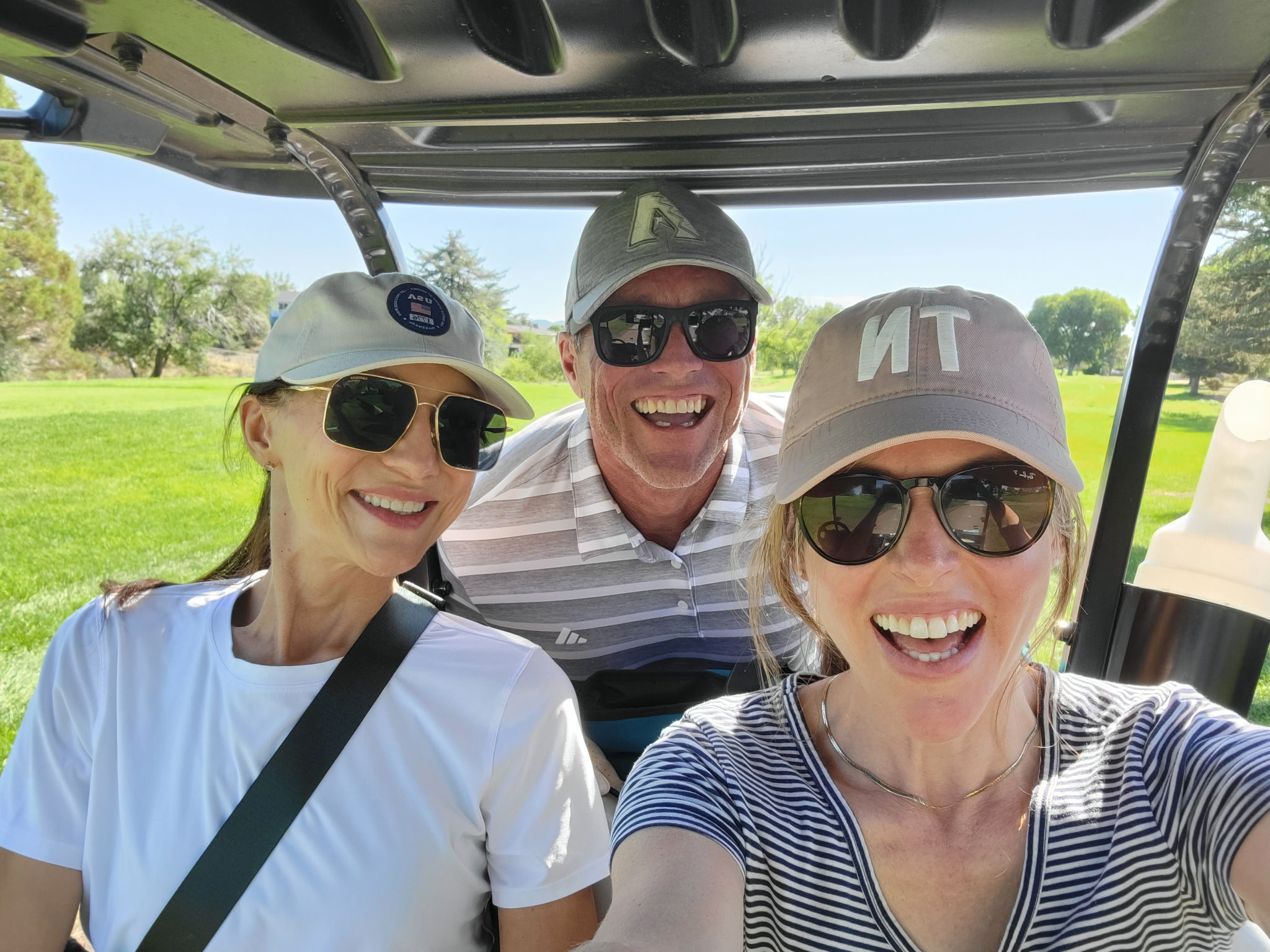 Kelly, Steve, and Christine between holes