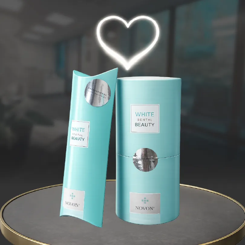 Light blue cylindrical packaging and its box labeled 'White Dental Beauty' by Novon on a round table with a glowing heart shape in the background.