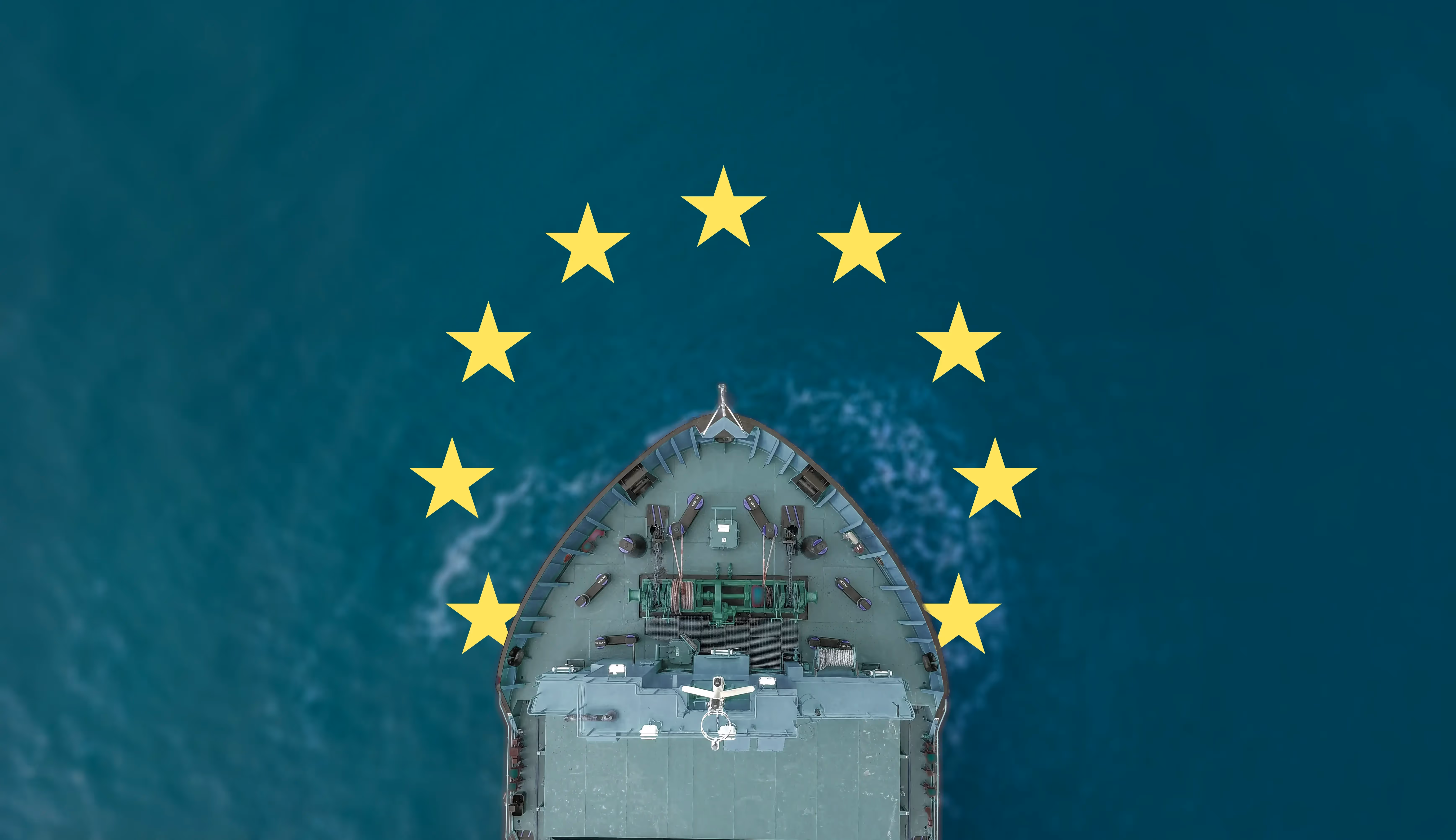 Top-down view of a vessel moving through the ocean. The European Union flag encircles the front of the ship.