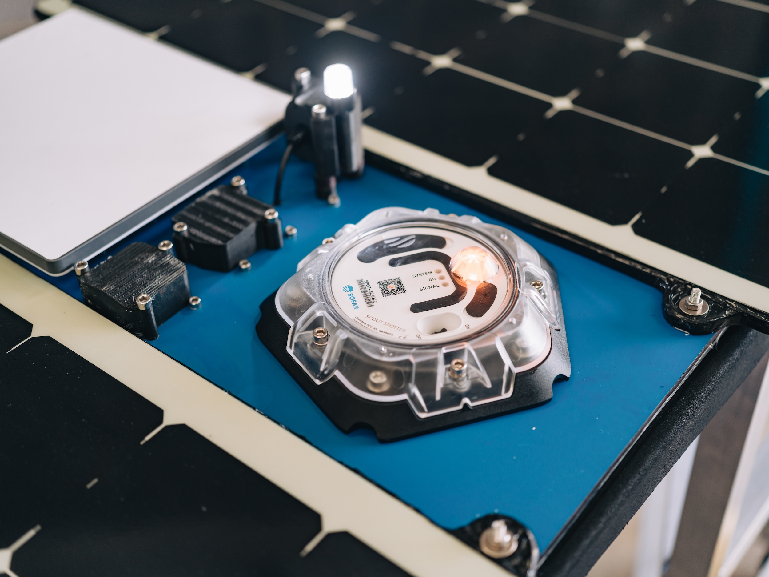 Spotter's sensing technology embedded in Scout, measuring waves, wind, and barometric pressure with optional subsurface sensing via Bristlemouth.