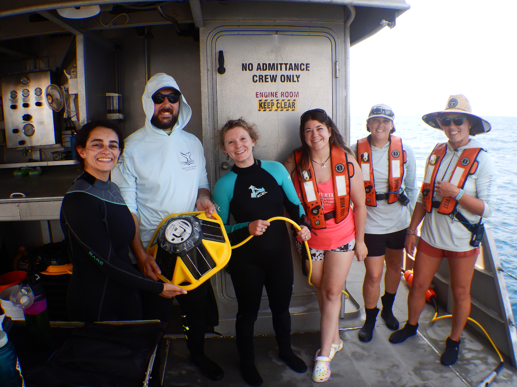 The FGBNMS research team with a Spotter buoy 