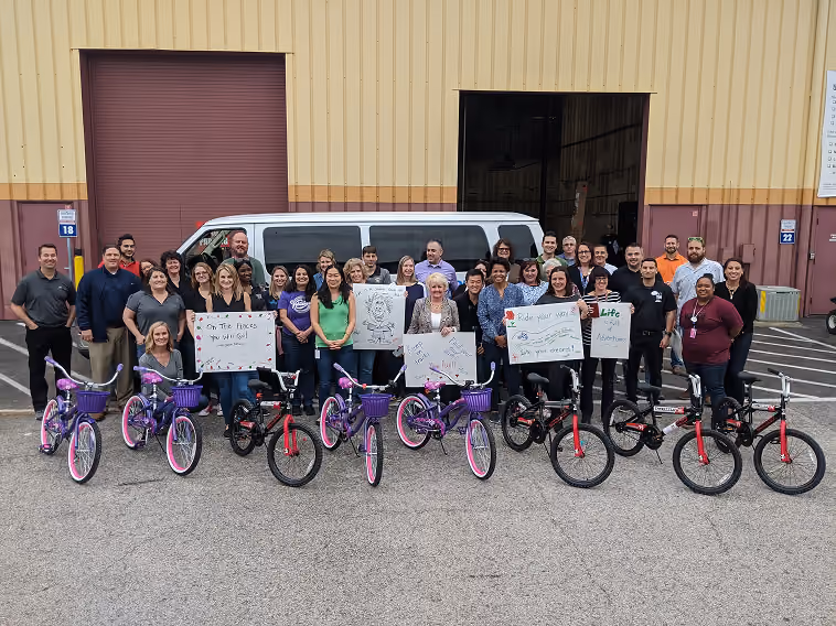 Corporate team building bicycles for charity in the Bicycle Build Challenge