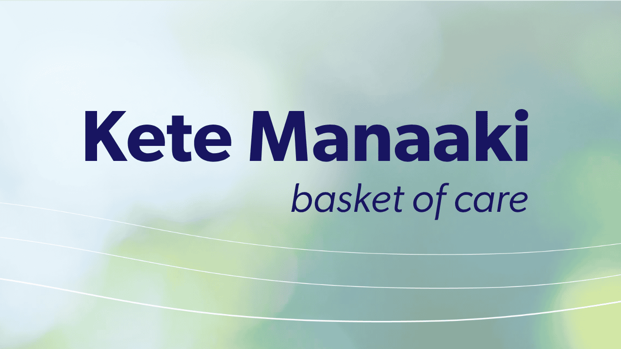 Kete Manaaki - basket of care sits on a blurred, soft green and blue background