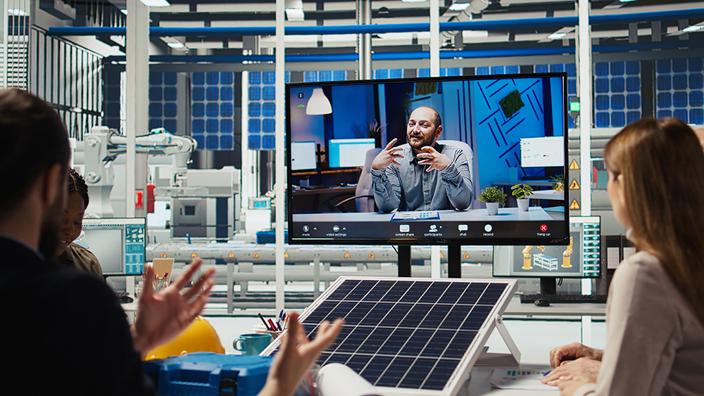 People talking to a man on a video call