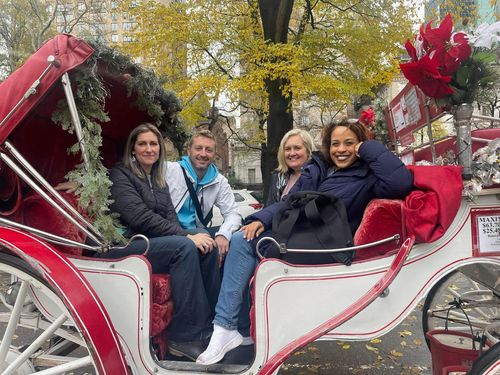 Employees in Horse Drawn Wagon at Park