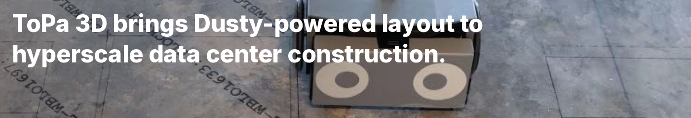 A Dusty Robotics FieldPrinter on a concrete slab printed with multi-trade layout lines and blockout callouts
