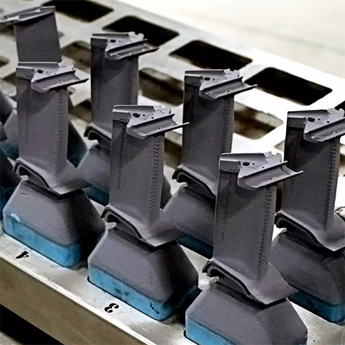 RB211 gas turbine blades with Liburdi LSR aluminide coating, mounted in fixture for processing