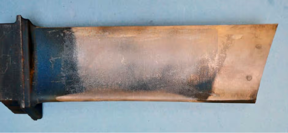 Gas turbine blade as received with ground surfaces and wear before inspection and repair
