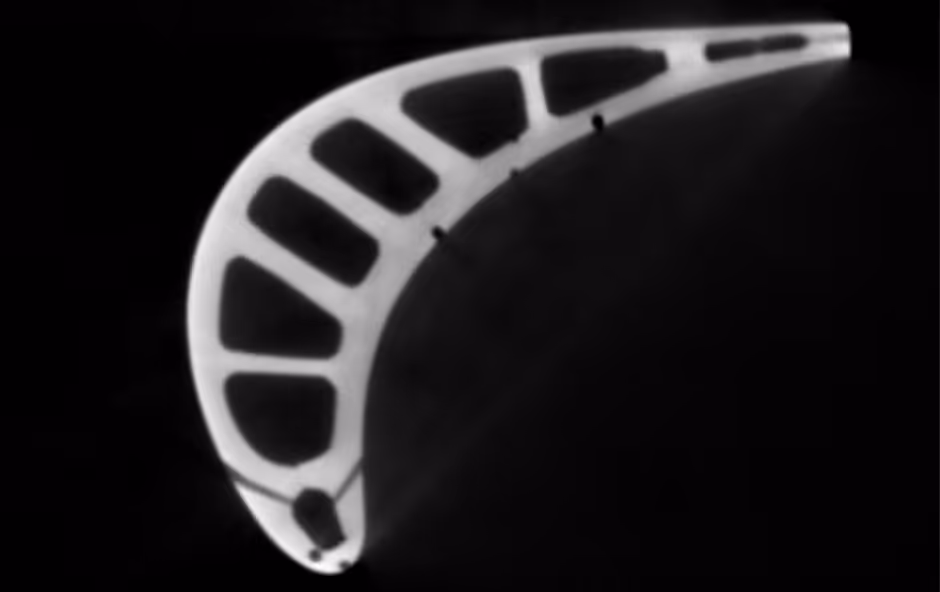 CT scan section view of gas turbine blade showing internal structure and cooling passages