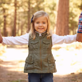 little girl with family