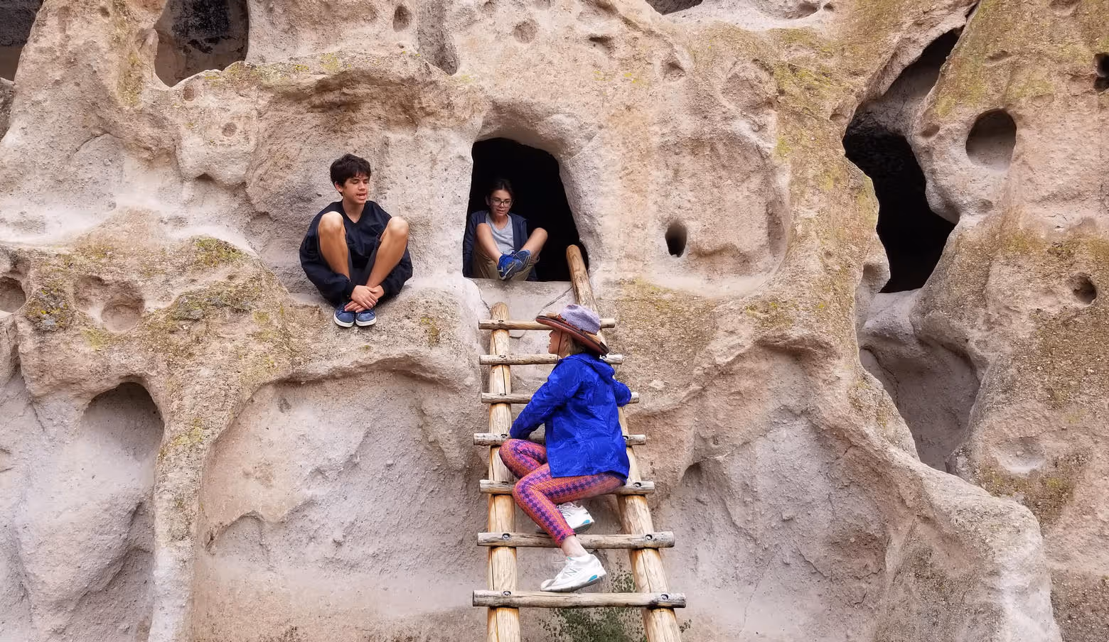 Bandelier caves with hikers