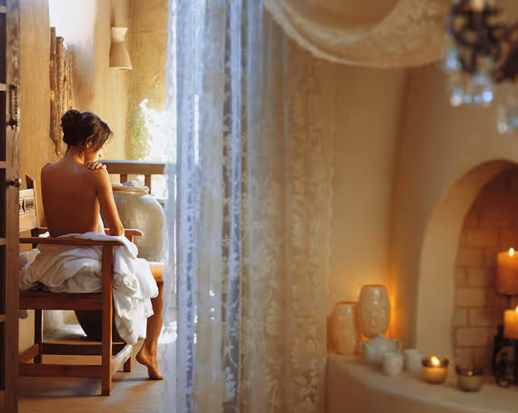 Woman sitting at The Spa at Loretto