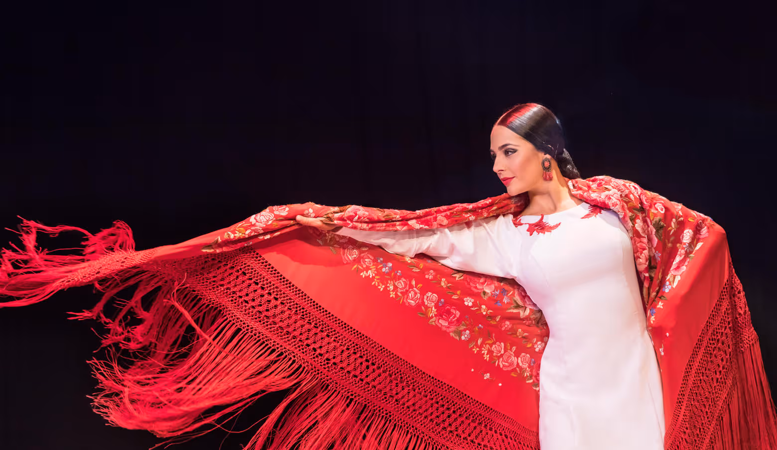 La Emi flamenco dancer in white and red dress