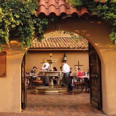 Wolf and Roadrunner patio with people dining