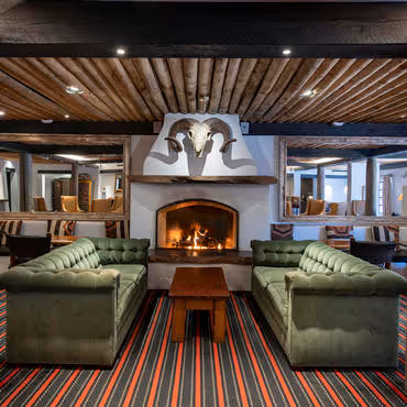 The Living Room Lounge at Inn and Spa at Loretto with fireplace and couches