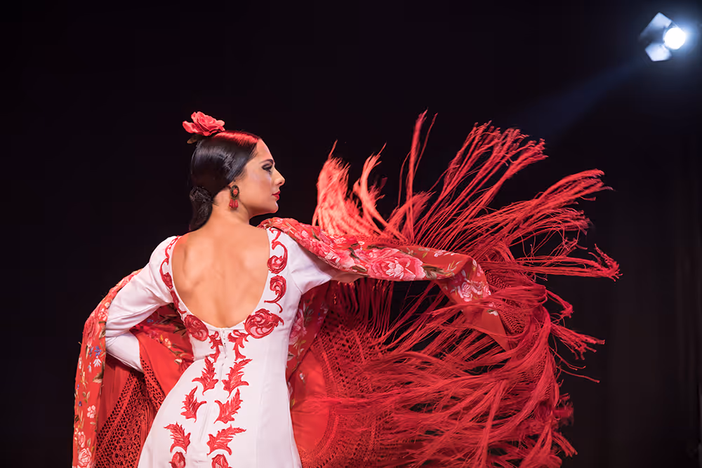 La Emi flamenco dancer in white and red dress