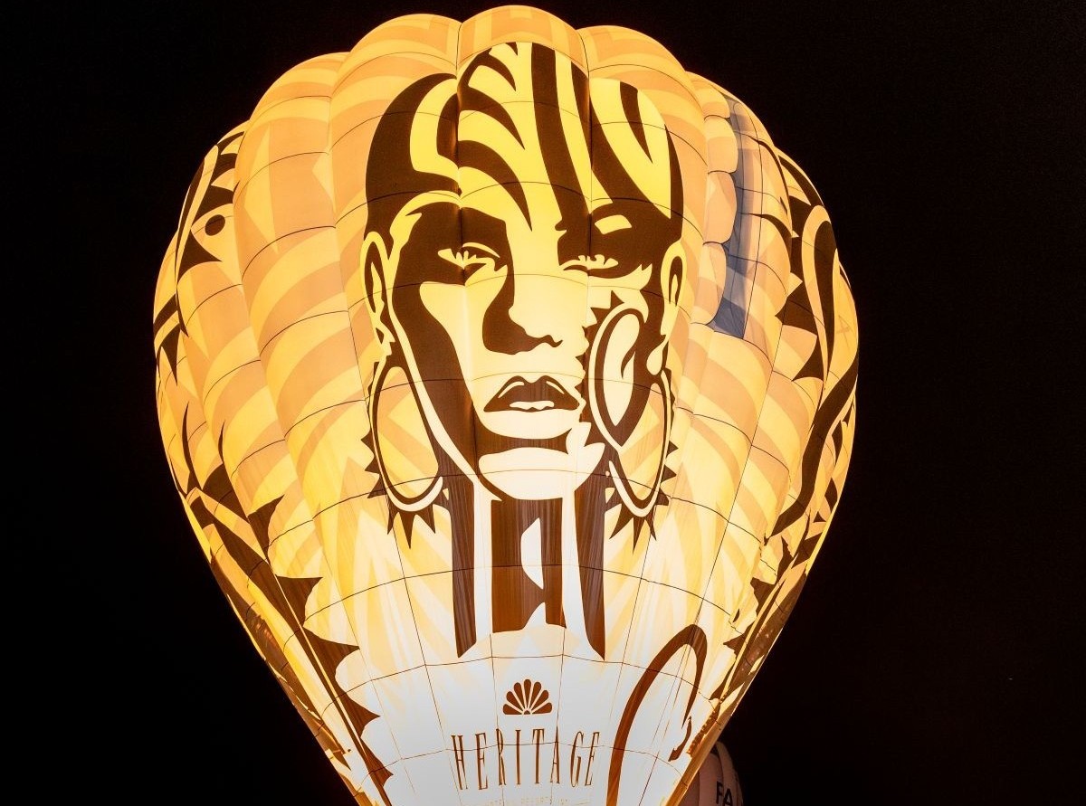 Pueblo Revolt balloon lit up