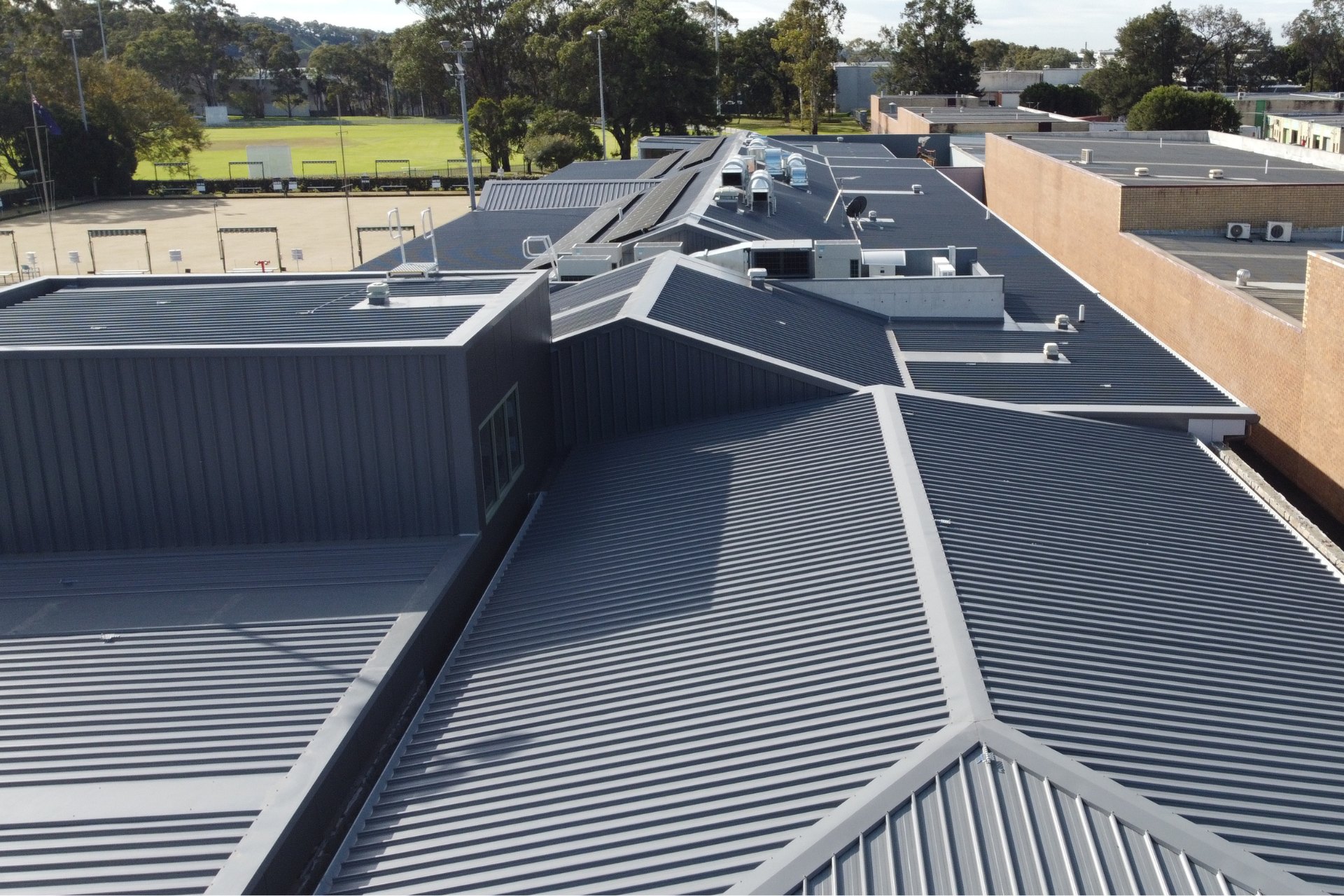 Close up view of commercial building with metal roofing.