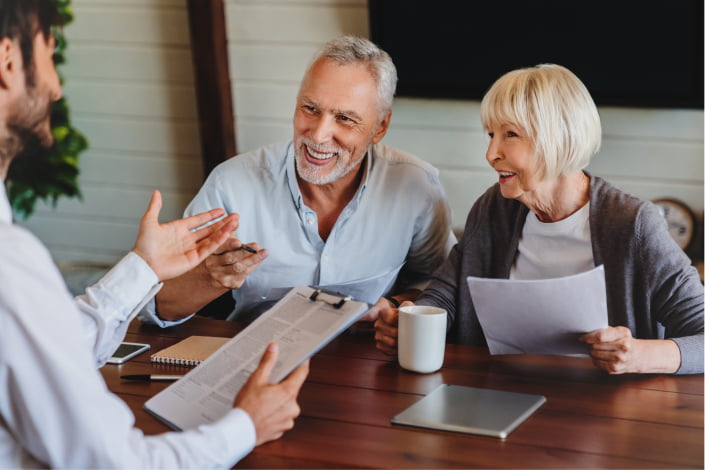 Retired couple in financial meeting with financial professional