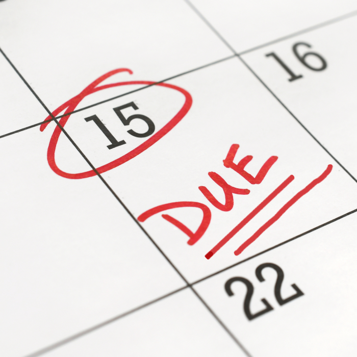 Tax day circled on a calendar