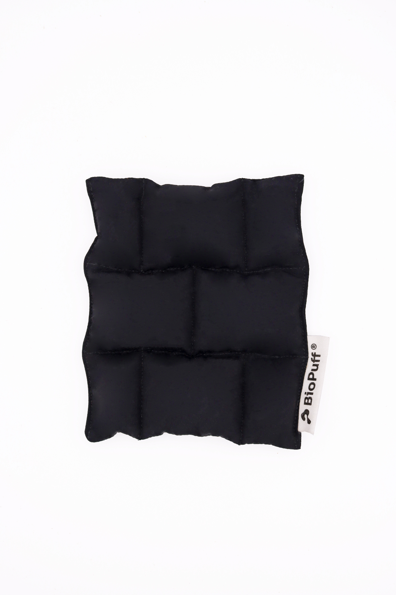 Small black quilted pouch with a white tag labeled BioPuff on a white background.
